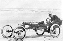 Olds driving the Pirate Racer on a beach