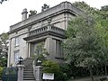 The 1910 home of Samuel Hill (814 E Highland Drive on Capitol Hill), designed by Hill in collaboration with Hornblower & Marshall, is an early example of concrete construction.[69]