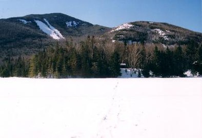 Wright Peak as seen from Marcy Dam (note snow-covered Marcy Dam Pond, foreground)