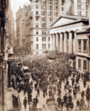 A swarm gathers on Wall Street during the bank panic in October 1907