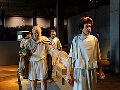 Roman citizens walking to a burial