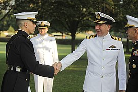 Admiral Sir George Zambellas wearing No. 1WC White ceremonial dress (white tunic option)