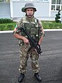 Montenegrin soldier holding a HK MP5