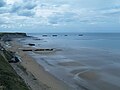 Elements of the Mulberry harbour are still present at Arromanches