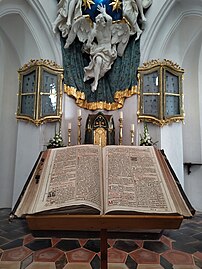 Scripture in front of the main altar