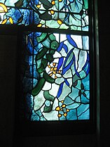 A section of the chapel stained-glass windows by John Piper
