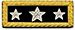 An insignia with a navy blue background and three silver stars