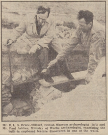 Black & white photograph of Rupert Bruce-Mitford and Paul Ashbee excavating at the Mawgan Porth Dark Age Village