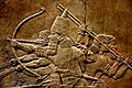 Image 307th-century BC relief depicting Ashurbanipal (r. 669–631 BC) and three royal attendants in a chariot (from Culture of Iraq)