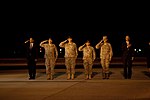 Barack Obama and generals saluting U.S. personnel who died in Afghanistan