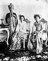 Portrait of Gusti Bagus Djilantik and his two wives. The furniture was a gift from Queen Wilhelmina