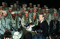 U.S. Secretary of Defense Donald Rumsfeld with troops at Bagram Air Base, December 2001