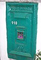 Hong Kong Post box bearing insignia of King George V