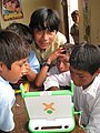 Image 24Peruvian school children with an OLPC XO-1 laptop (from Demographics of Peru)