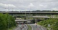 Image 10The multi-level junction between the M23 and M25 motorways near Merstham in Surrey. The M23 passes over the M25 with bridges carrying interchange slip roads for the two motorways in between.