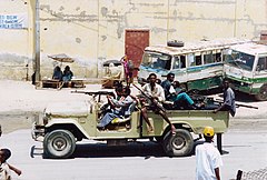 Armed men on vehicle