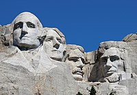 Gutzon Borglum and his son, Lincoln Borglum, Mount Rushmore, 1927–1941. L–R, George Washington, Thomas Jefferson, Theodore Roosevelt, and Abraham Lincoln.