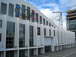 The Wembley Arena with the Olympic logo on the building.