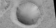 Crater with dark slope streaks, as seen by HiRISE under HiWish program