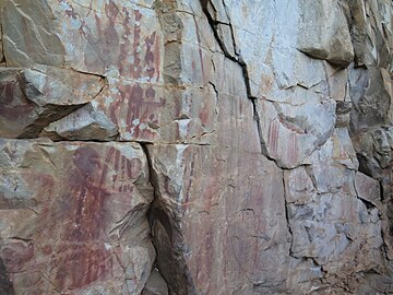Cave paintings: Vertical lines and different figures