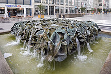 The Blätterbrunnen of 1976 by Emil Cimiotti, as seen 2014 in the city center of Hanover, Germany. A lost-wax method was used for the bronze leaves.