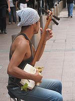 Japanese style shamisen, 2006 played by a man in Australia. Related to sanxian