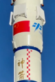 The Long March 2F rocket with folded grid fins carrying Shenzhou 12 mission spacecraft, inscribed with "Divine Arrow" (神箭) in Chinese