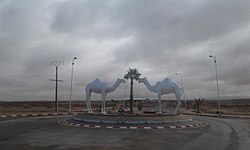 Two camel statues mark the entrance to Tan-Tan, 2009