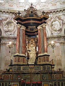 One of the statues on the main altar, representing either hope or charity