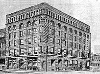 An 1891 image of the 1889 Power Building, named after magnate Thomas C. Power[130]
