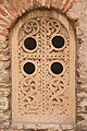 A carved window.