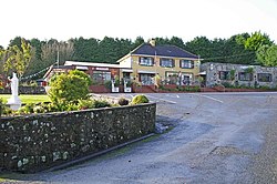 Road junction and pub in Ardpatrick village