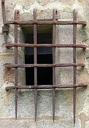 A barred window of the church