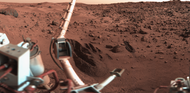 Trenches dug into the Martian surface by the Viking I Lander. The color is fairly accurate with the pink sky. The trenches are in the "Sandy Flats" area of the landing site at Chryse Planitia. The boom holding the meteorology sensors is at left. Click on image to see more details.