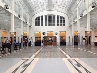 Main banking room, with a glass and steel ceiling and glass floor