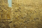 Relief depicting Sennacherib at Lachish, interacting with officials and reviewing prisoners