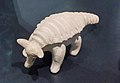 A stone figure of an armadillo
