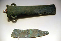 Bronze axe and copper knife, Qijia Culture, Gansu. Probably derived from the Seima-Turbino culture.[10]