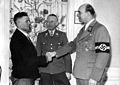 SS-Obergruppenführer Arthur Greiser begrüßt den Millionsten wieder angesiedelten Volksdeutschen, Litzmannstadt, März 1944