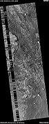 Wide view of layers in Schiaparelli Crater, as seen by HiRISE under HiWish program. Part of the picture is degraded. Parts of this image are enlarged in other images that follow.