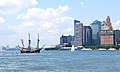Image 11A historical juxtaposition: a replica of Henry Hudson's 17th-century Halve Maen passes modern-day lower Manhattan where the original ship would have sailed while investigating New York Harbor. (from History of New York (state))