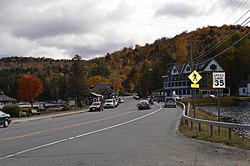 The hamlet of Long Lake approaching on N.Y. Route 30 from the bridge.