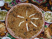 Osh palov, a staple dish in Uzbek, Tajik, and Bukharan Jewish cuisine