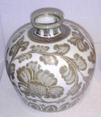 Song dynasty (960-1279 AD) Ding ware porcelain bottle, iron-tinted under-glaze decoration