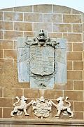Coat of arms of Charles V above the gate