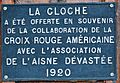 Plaque on the Church: "The Bell is given in remembrance of the collaboration of the American Red Cross with the Association of Devastated Aisne".