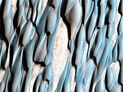 Dunes in Abalos Undae. The blue areas indicate the presence of dunes of basaltic origin, while the light-colour areas are probably dust.