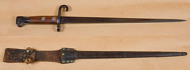 Bayonet and scabbard issued with the rifle