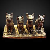 Four cats; 664–332 BC; wood; height: 14 cm, width: 27 cm; Louvre