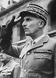 A French military officer saluting.